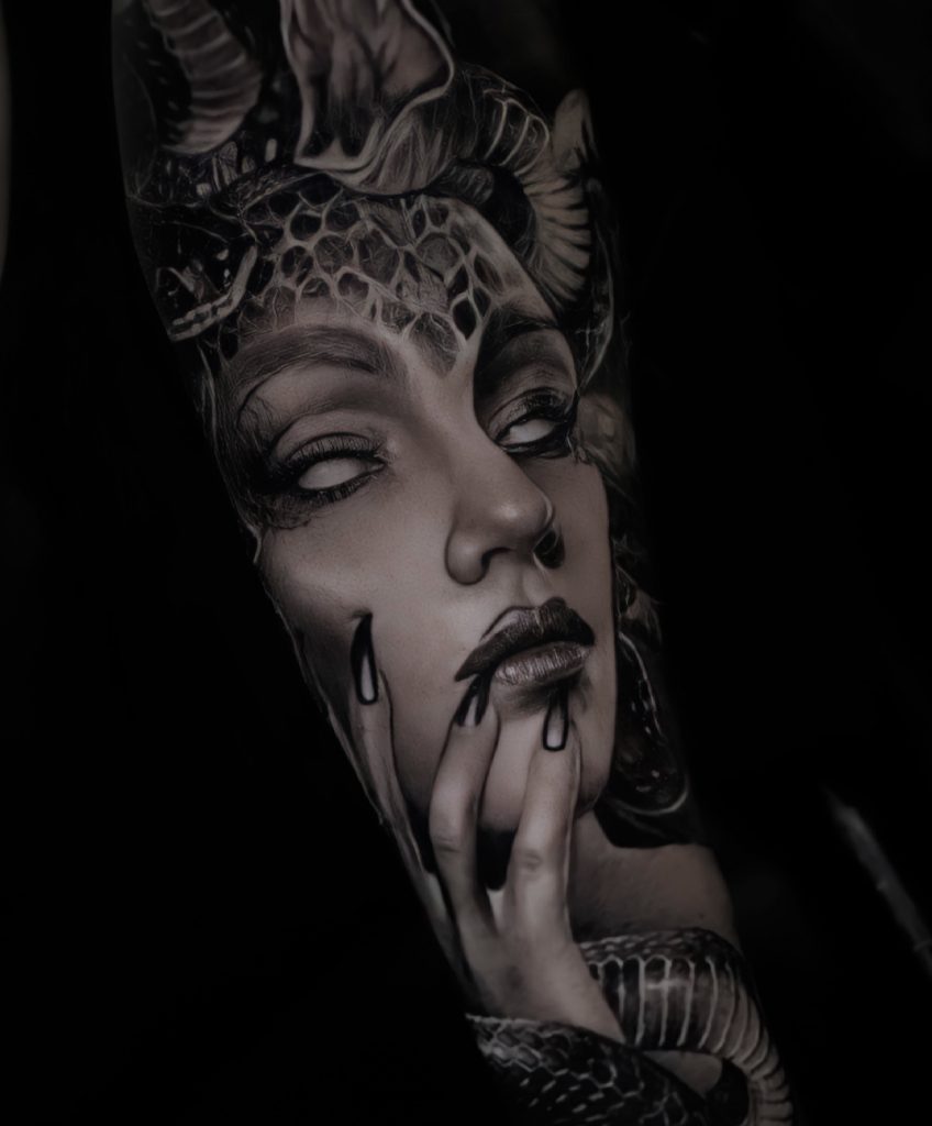 realism-means-a-portrait-of-someone-is-recreated-as-a-tattoo