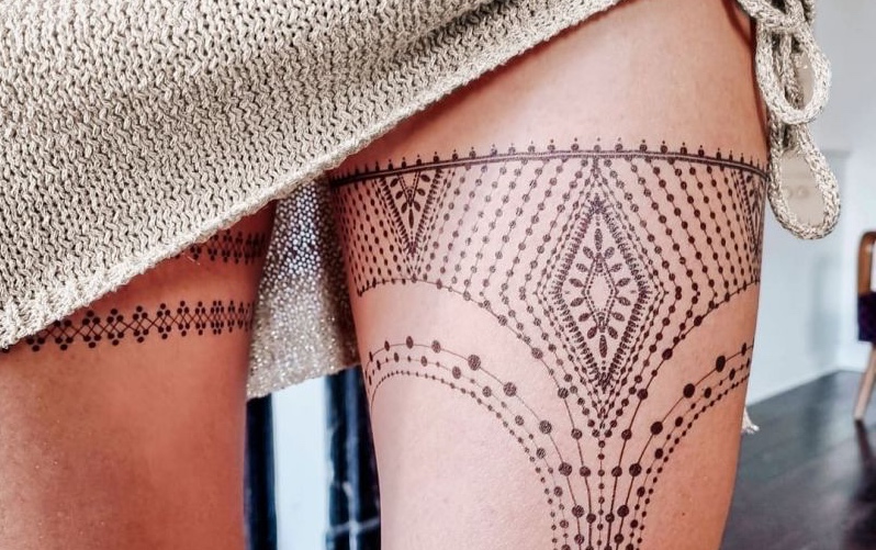 The perfect place for a garter belt tattoo