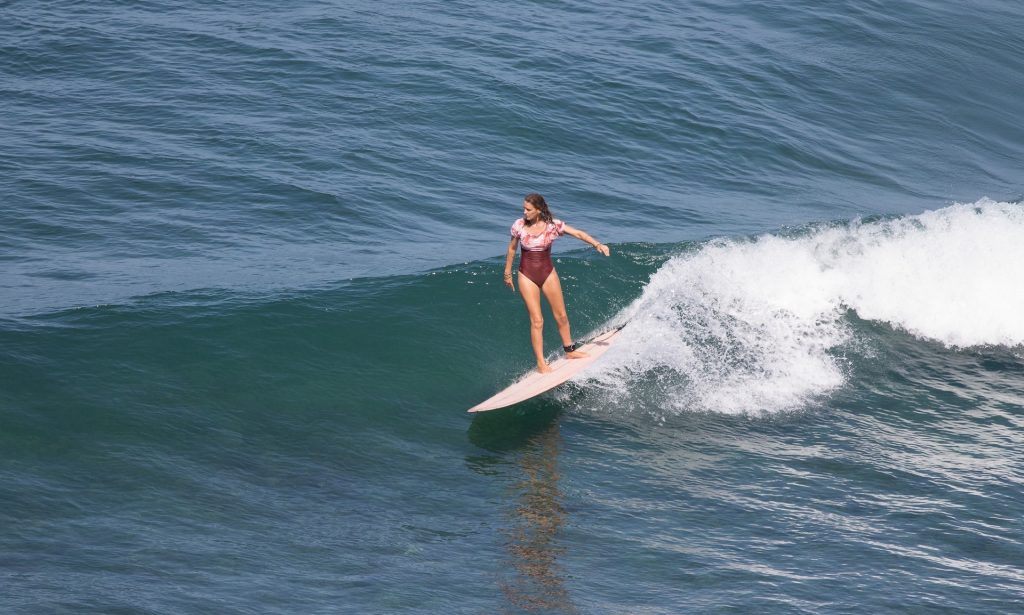 riding the wave in bali beaches